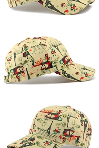 Detalle de gorra vintage con diseño de París, estampado de Torre Eiffel y hebilla metal
