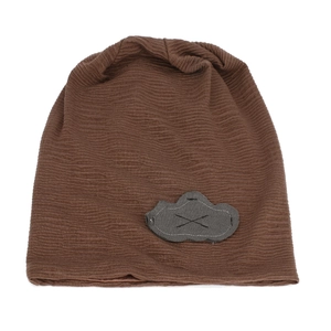 Close-up of brown wavy knit slouchy beanie featuring a grey patchwork detail
