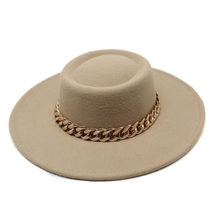 Detailed texture of khaki wool felt boater hat featuring a chunky gold metal chain link