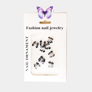 Professional pack of 3D black and white butterfly nail jewelry for stylish nail art designs