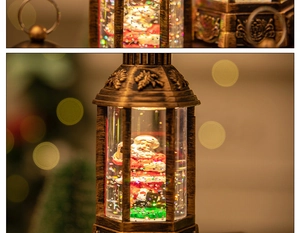 Macro shot of bronze Christmas lantern featuring Santa Claus and glitter snow