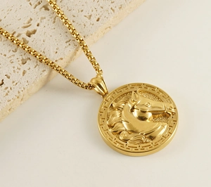 Detail showing a 3D horse relief and Greek key pattern on 18k gold-plated pendant necklace