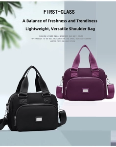 Detail view of water-resistant nylon bags in black and purple with silver metal logo