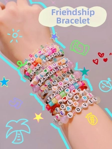 Close-up of colorful Taylor Swift friendship bracelets with acrylic letter beads