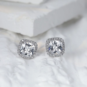 Cushion-cut halo stud earrings with square zirconia in a minimalist silver setting