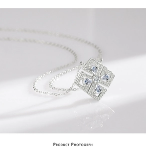 Macro shot of S925 silver flower pendant with glittering teardrop cubic zirconia