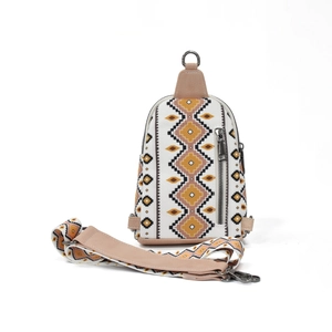 Detail of ethnic geometric canvas chest bag with detachable wide strap and metal hardware