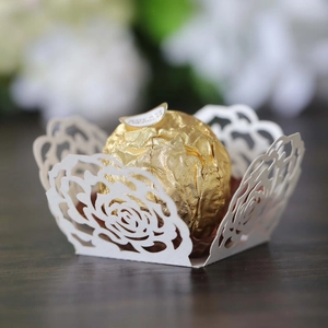 Exquisite laser-cut white rose pattern paper wrappers for chocolates or cupcakes