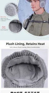 Detail of gray knitted winter hat with thick faux fur lining and snowflake patterns