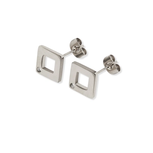 Detail of silver geometric square stud earrings with hollow center and butterfly backings