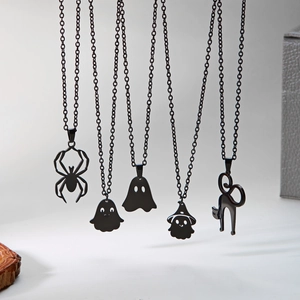Set of five black metal Halloween necklaces featuring spider, ghost, and black cat pendants