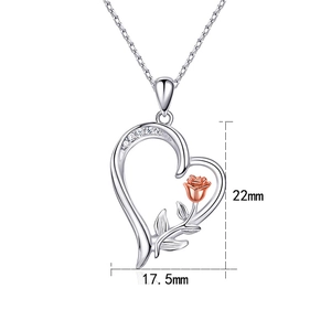 Macro detail of S925 silver heart necklace with rose gold flower and 22mm height scale