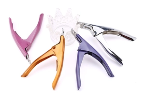 U-shaped nail clippers in four metallic colors displayed on a white background