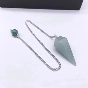 Detail shot of a light green natural crystal hexagonal prism pendant with silver chain
