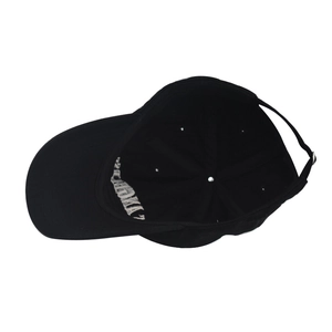 Detail of the black cotton baseball cap showing interior stitching and adjustable metal buckle