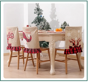 Three festive Christmas dining chair covers featuring Santa and elk embroidery for home decor