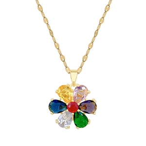 Rotating floral titanium necklace with colorful teardrop crystals on a golden chain