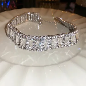 Elegant silver-toned choker necklace with rectangular and round pavé-set crystals