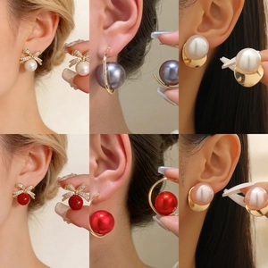 Exaggerated large pearl C-shaped stud earrings in white, red, pink, and grey colors