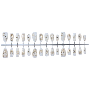 Faux ongles amande œil de chat avec motifs lune étoile dorés et strass brillants
