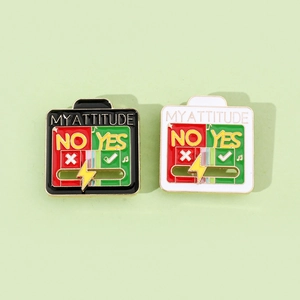Creative slider mood brooch featuring Yes or No design in black and white enamel finish