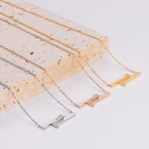 Minimalist double T geometric necklace with crystals in silver, gold, and rose gold
