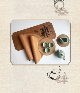 Close-up of hand-woven oval bamboo tea mat with traditional Chinese calligraphy detail