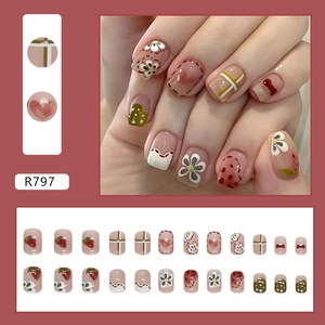 Cute floral press-on nails with hand-painted patterns and heart designs, 24-piece set