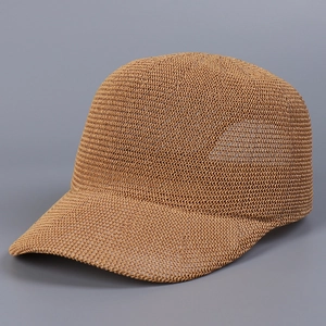 Close-up of the breathable honeycomb knit texture on a khaki summer baseball cap