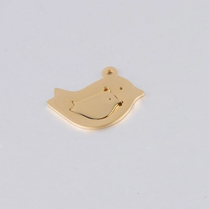 Detailed view of golden stainless steel mother and child bird charms for DIY jewelry making