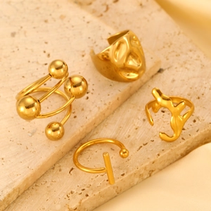 18k gold plated stainless steel teardrop and lava style open rings set on stone
