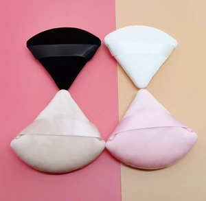 Soft velvet makeup puffs in fan shape with ribbon handles in black, pink, and beige