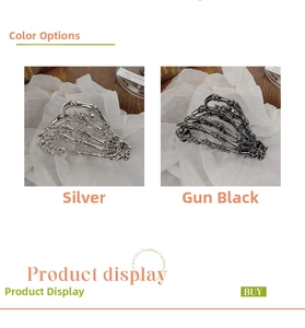 Detailed comparison of gothic skeleton hand hair claws in silver and gun black finishes