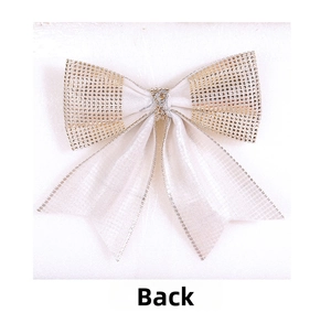 Detail view showing the back structure of a white organza Christmas bow with rhinestones