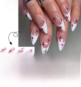 Detail of French white tip press on nails with purple metallic star designs and 24pc set