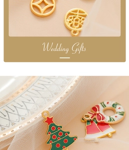 Detail of assorted enamel wedding charms including festive coins and floral wreaths