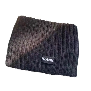 Black ribbed knitted sports headband with GRANK label for all seasons and outdoor sports