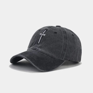 Distressed dark grey washed cotton baseball cap featuring white PEACE embroidery