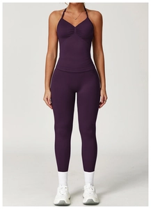 Detail of dark purple seamless yoga tank top fabric with ruched front and high elasticity