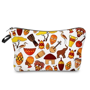 Close-up of African tribal pattern toiletry bag with black zipper and ethnic motifs