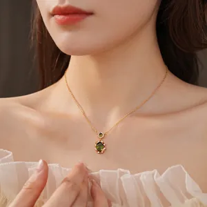 Luxury gold plated necklace featuring an oval green gemstone butterfly pendant and zircon