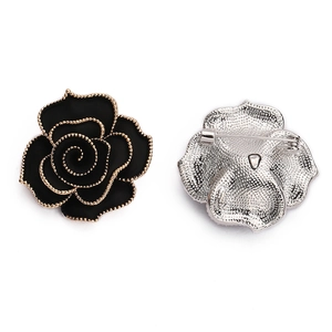 Vintage black rose brooch with gold edges and crystal accents, front and back view