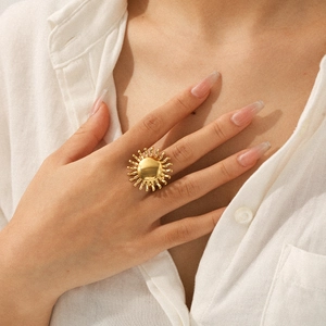 Elegance of 18k gold plated stainless steel sunflower open ring on a woman hand