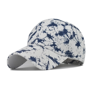 Tie-dye cotton ponytail baseball cap with blue and white pattern and curved brim