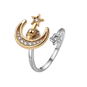 Adjustable star and moon spinner ring in gold and silver finish with sparkling zircons