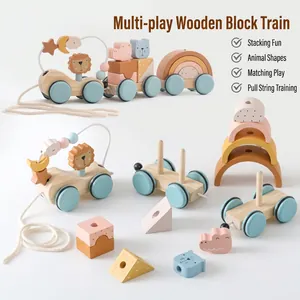 Detail of wooden montessori train toy with animal blocks in pastel morandi colors