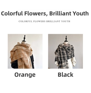 Detail of rose floral cashmere-feel scarf in orange and black with classic plaid pattern
