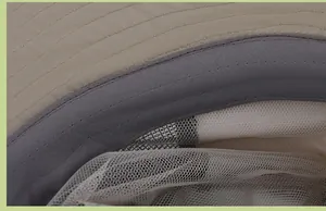 Detailed close-up of the breathable mesh lining and moisture-wicking sweatband inside the hat