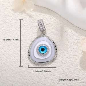 Silver evil eye pendant with blue resin and rhinestones, size 36.5mm by 22.6mm