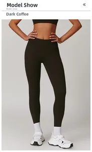 Detail of high-waisted quick-dry yoga leggings in dark coffee brown on a model